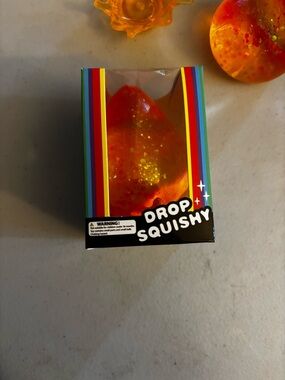 Drop Squishy Orange Glitter Stress Toy